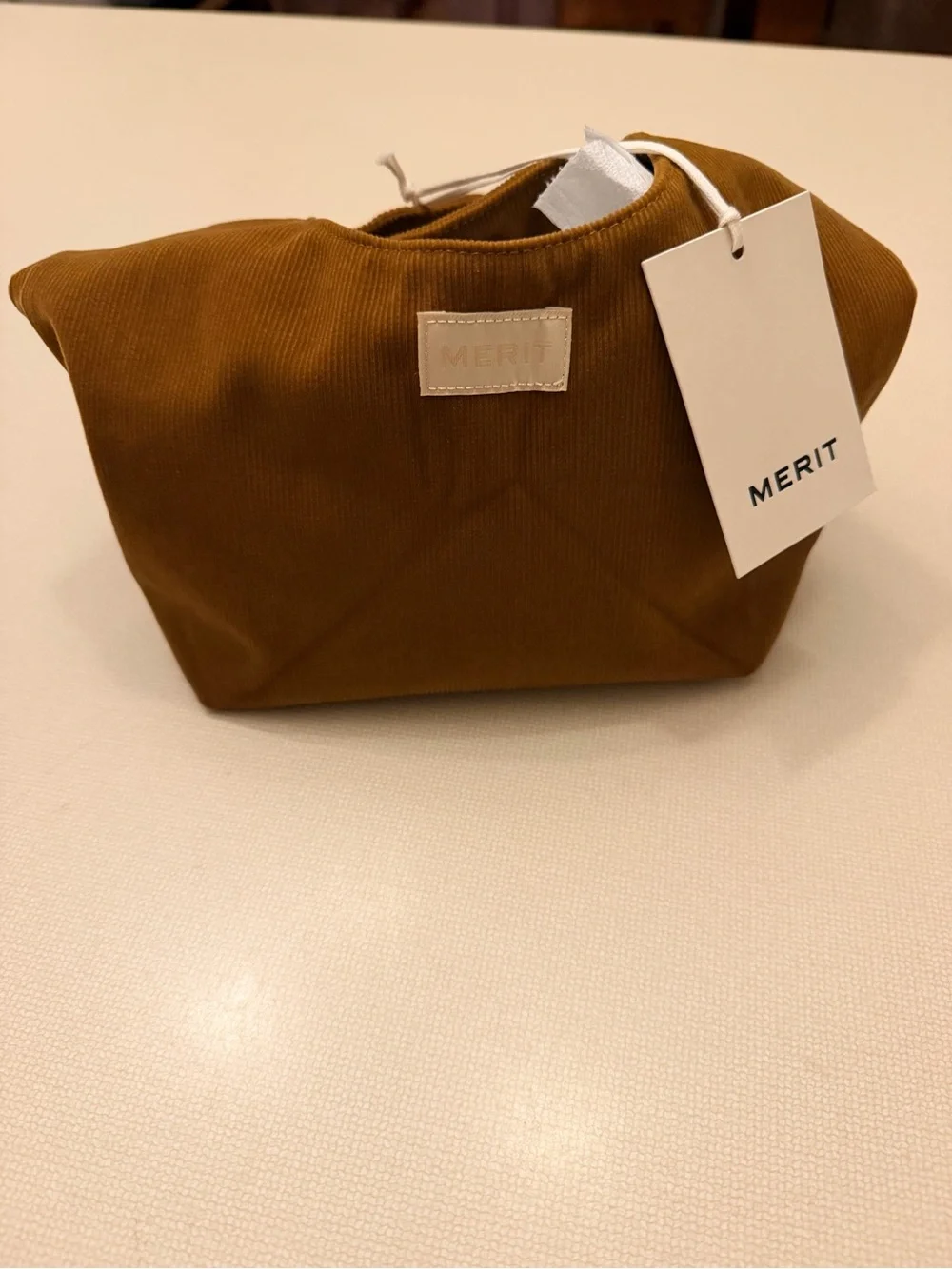 MERIT Corduroy Knot-Top Cosmetic Bag in Camel Brown